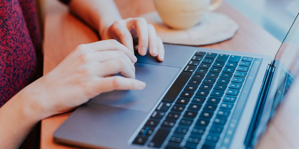 person using MacBook Pro